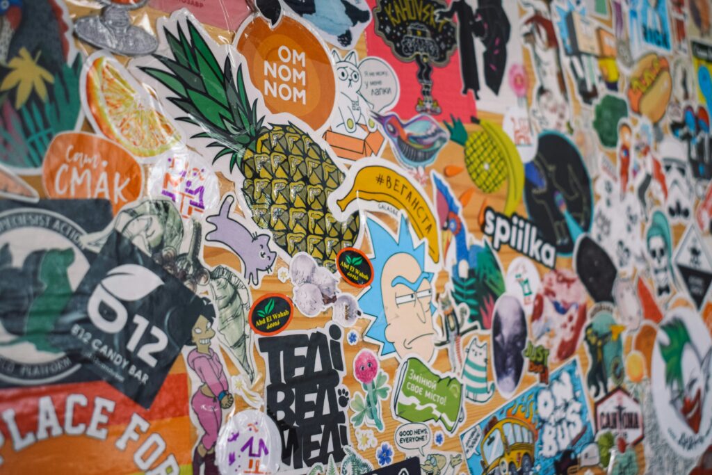 Colorful wall collage of stickers and illustrations