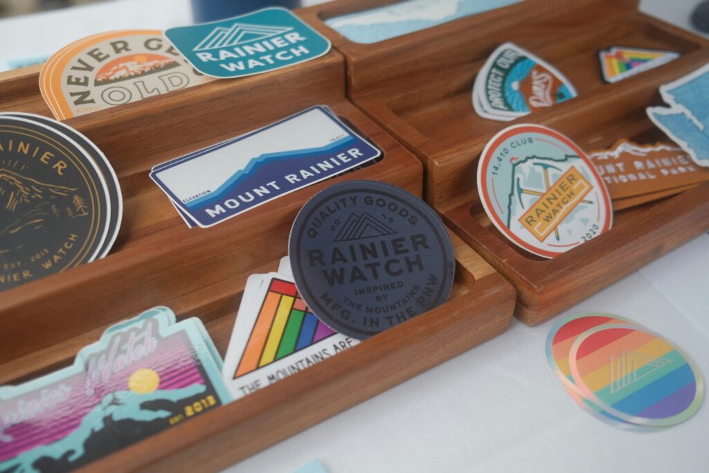 Colorful Mount Rainier themed stickers on display